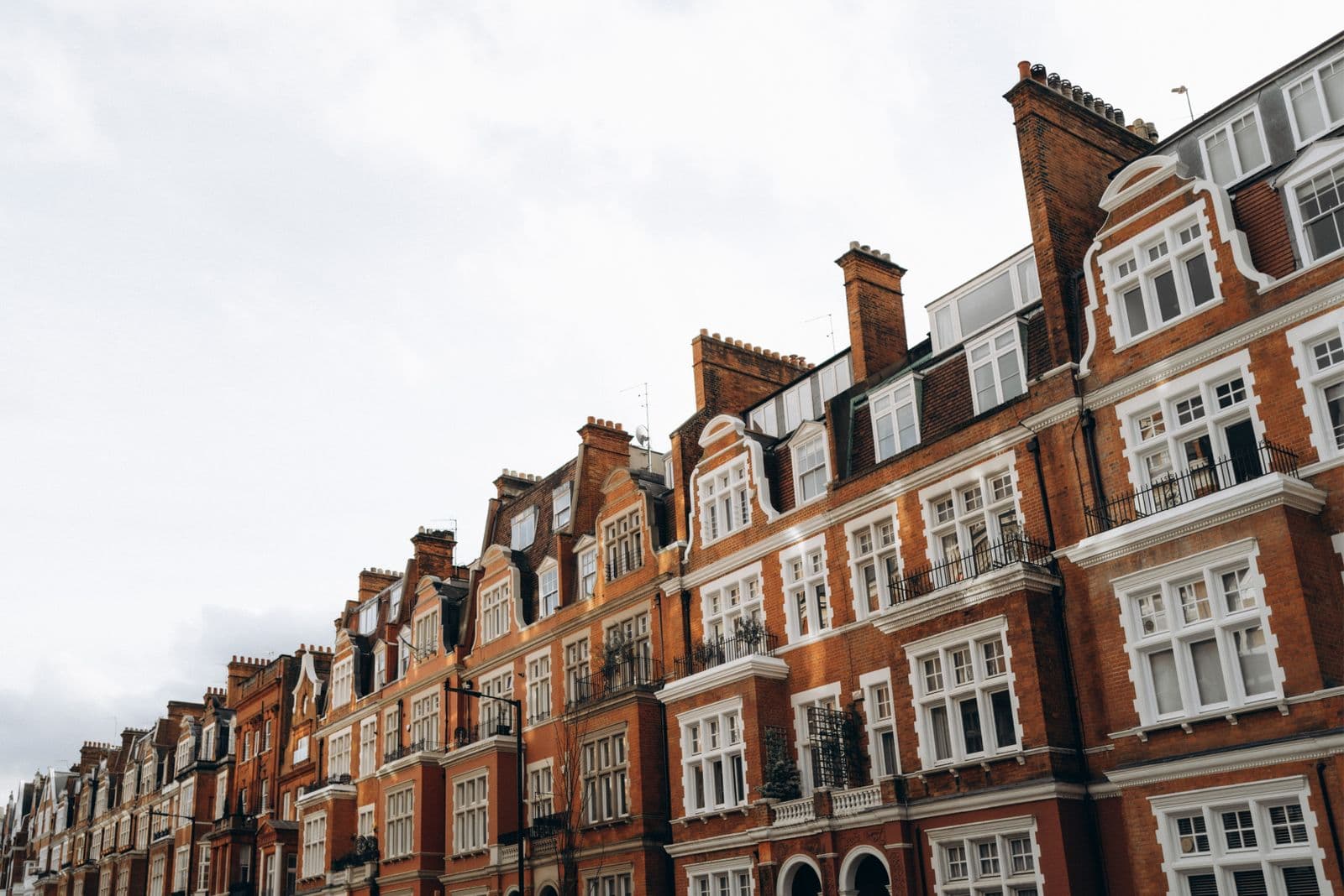 A UK terraced street shimmering in summer heat haze